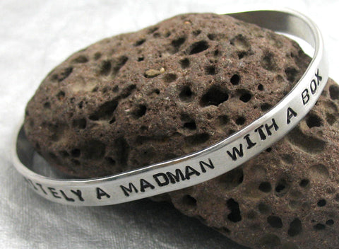 Definitely a Madman With a Box - Aluminum Handstamped 1/4" Bracelet