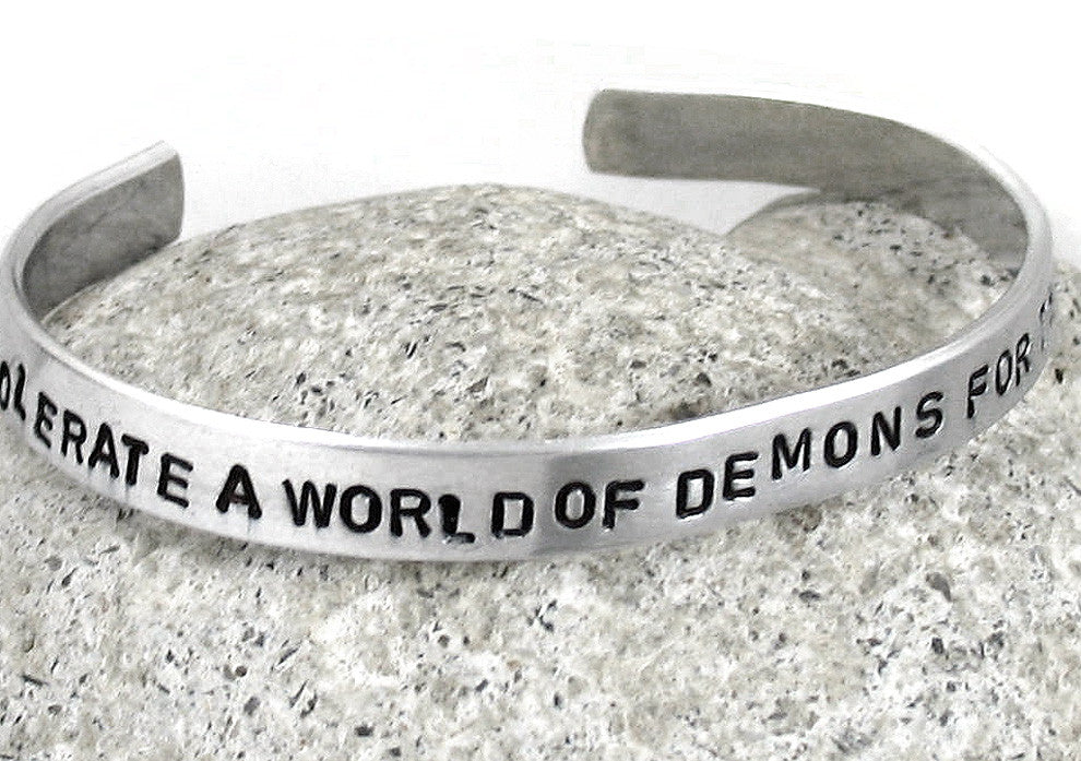 One May Tolerate a World of Demons for the Sake of an Angel - Aluminum Bracelet