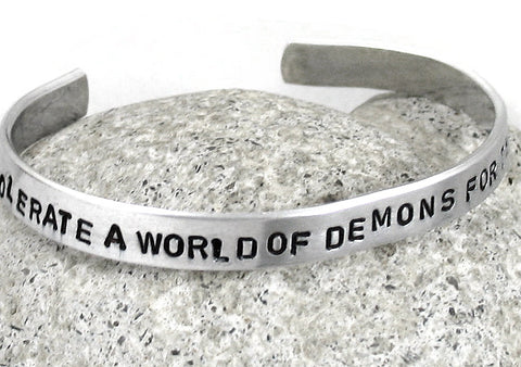 One May Tolerate a World of Demons for the Sake of an Angel - Aluminum Handstamped 1/4" Bracelet