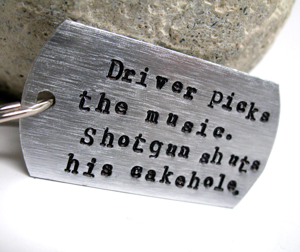 Driver picks the music. Shotgun shuts his cakehole. - Aluminum ID Keychain