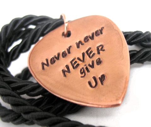 Never, never, never give up. - Copper Handstamped Guitar Pick Pendant