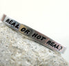 Real or Not Real? - Aluminum Bracelet